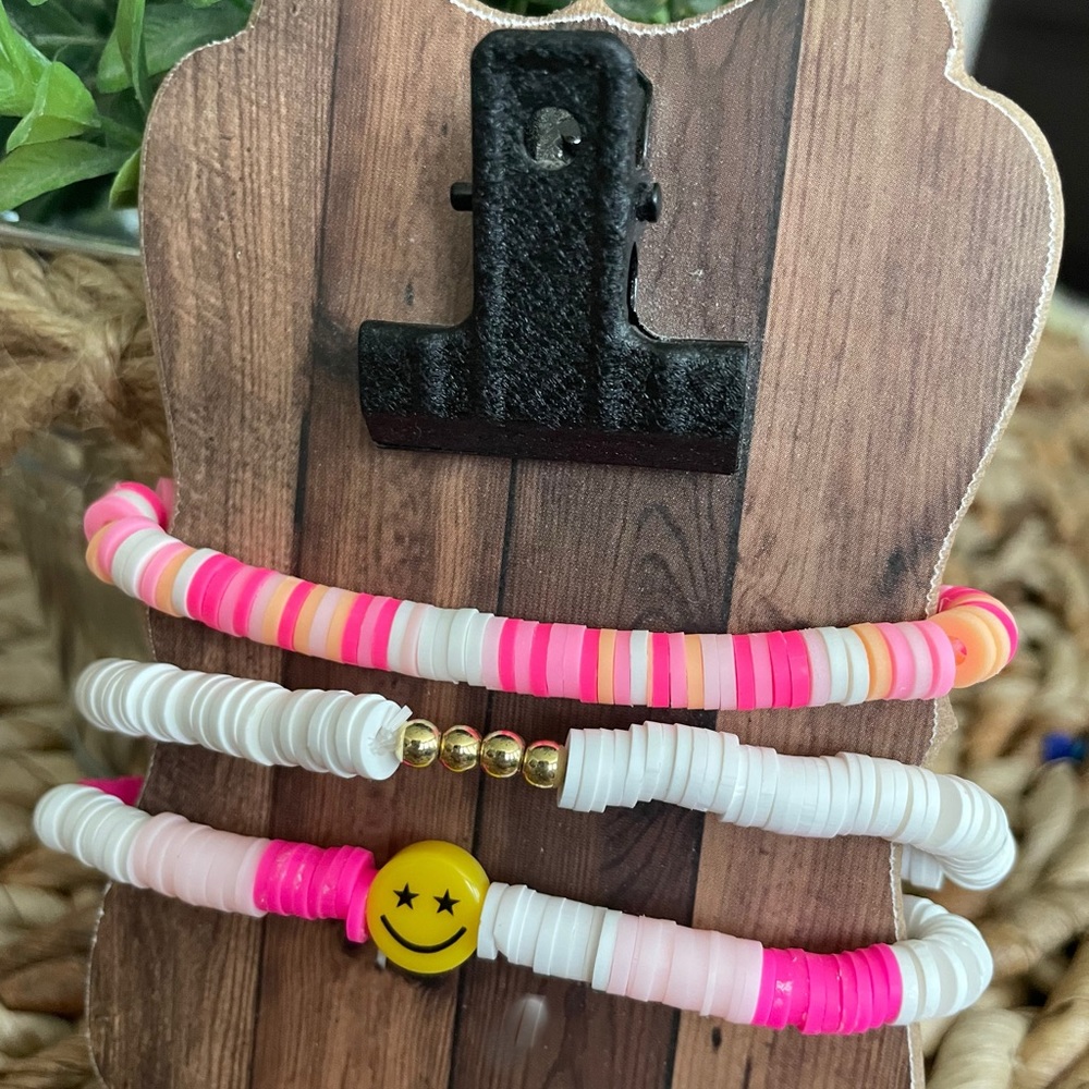Kids Clay Bead Bracelets with Smiley face in pink, white, orange. You get all 3